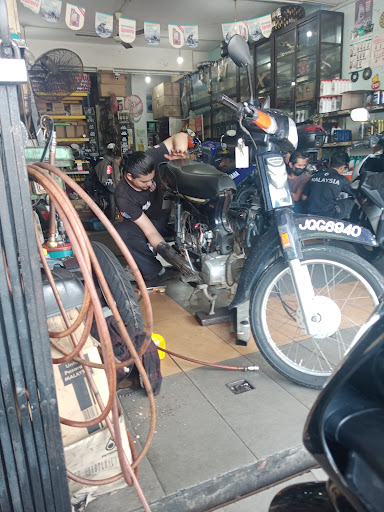 Bengkel Motosikal Along